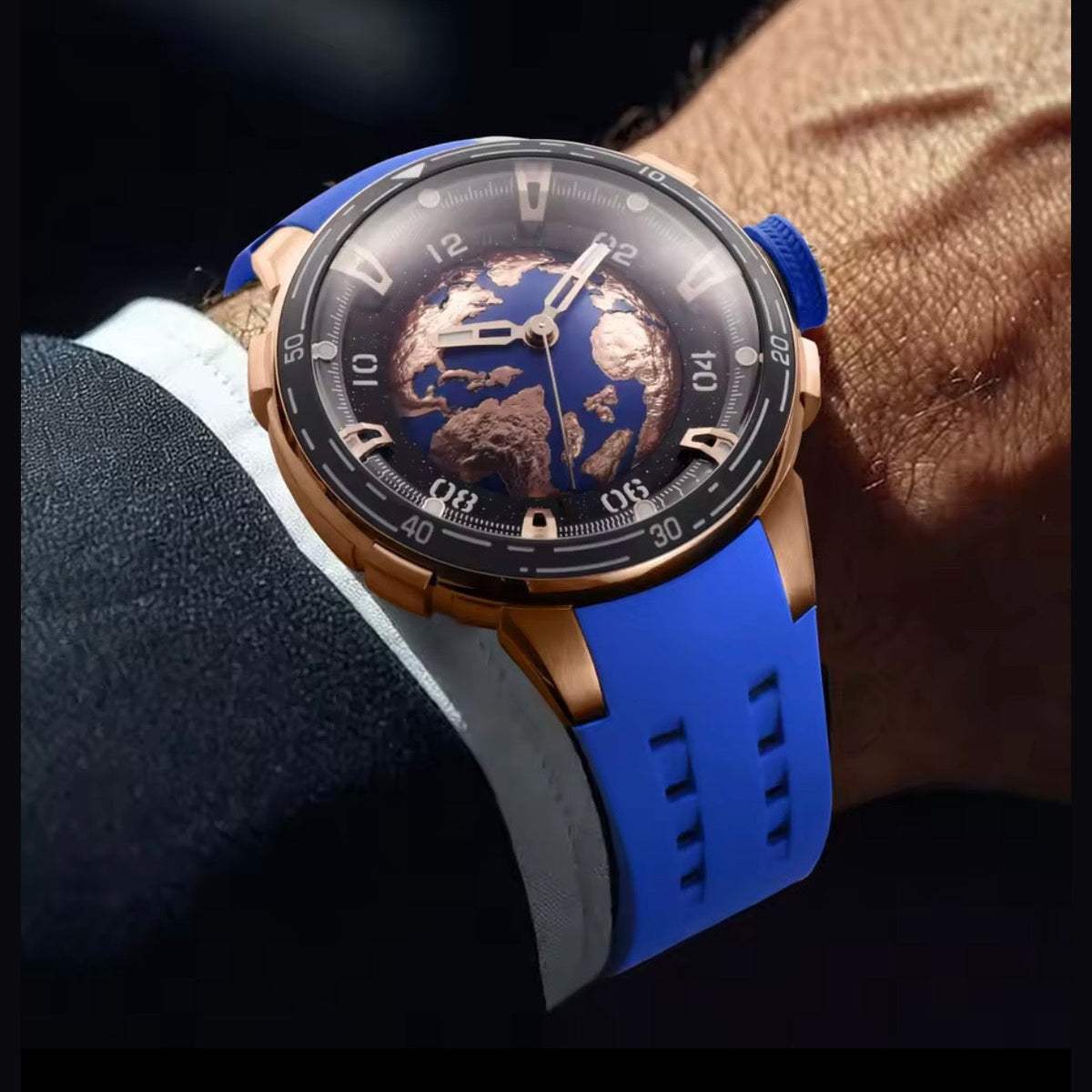PINDU P6676 Planet Series watch worn on the wrist, blue strap and gold Earth dial