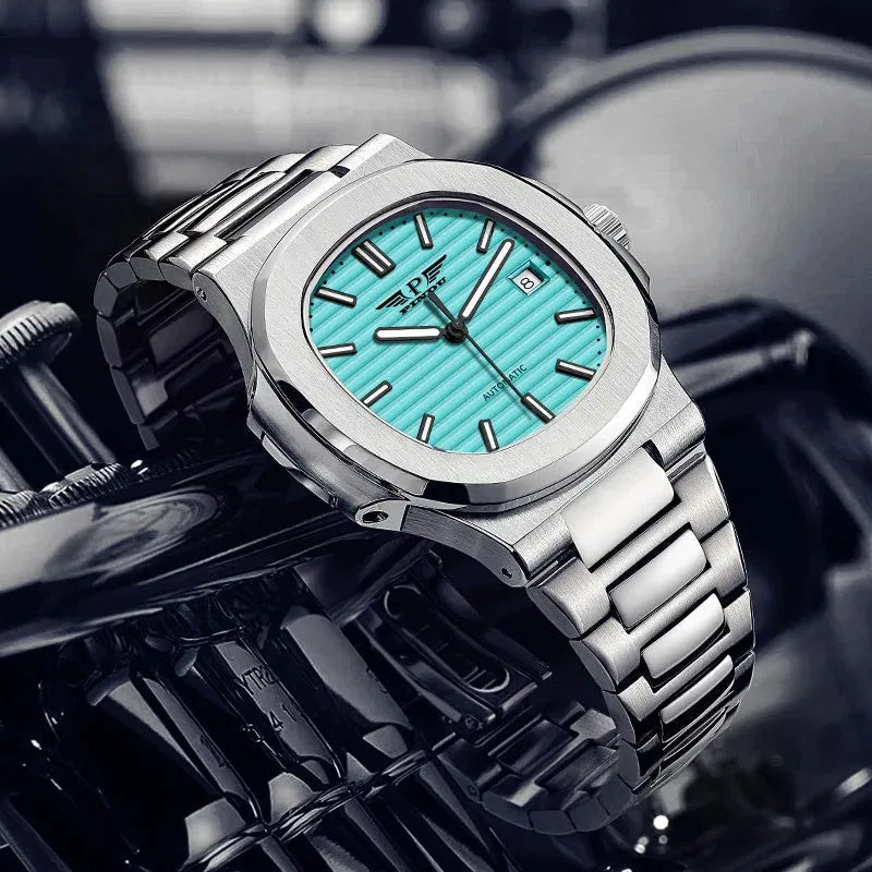 PINDU P6502 automatic moon phase watch lifestyle shot turquoise dial silver case steel bracelet motorcycle