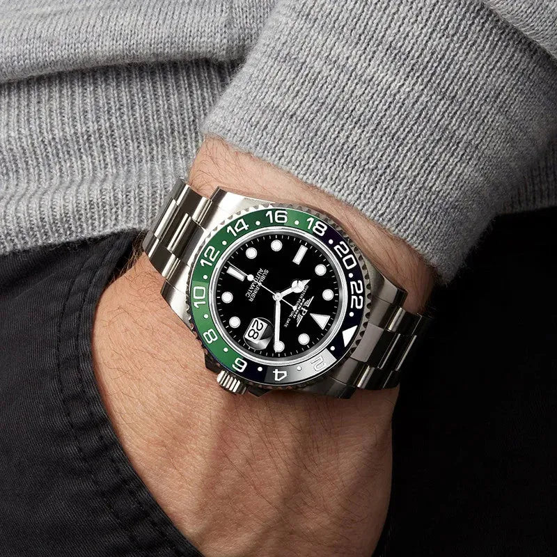 PINDU P6519 Water Ghost GMT automatic watch on wrist formal suit black dial green black GMT bezel two-tone bracelet