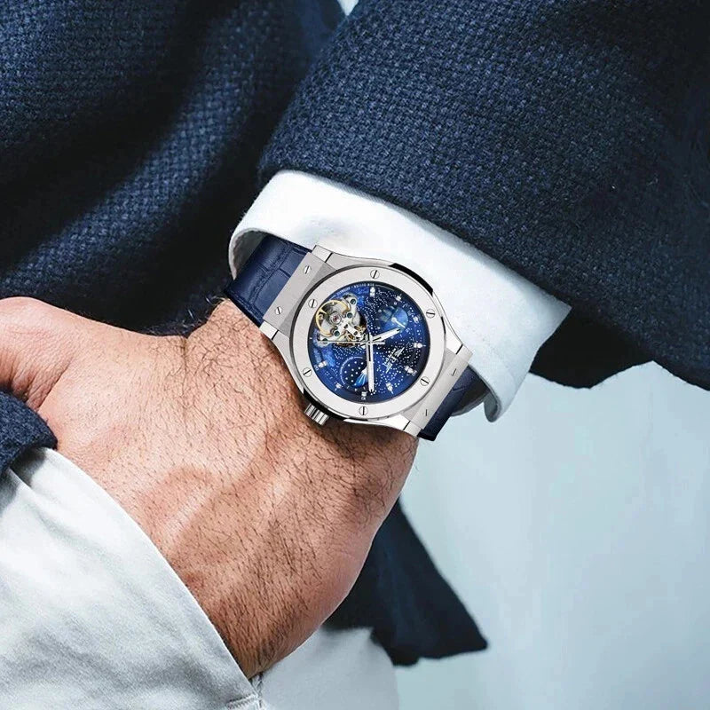 PINDU P6537 automatic moon phase watch on wrist navy blue leather strap blue starfield dial moonphase tourbillon complication daylight