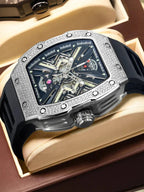 PINDU P6550 tonneau skeleton automatic watch diamond bezel silver case leather display roll angled overhead product shot