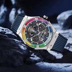 PINDU P6552 automatic skeleton watch rainbow colorful baguette diamond bezel angled view icy rocks blue environment