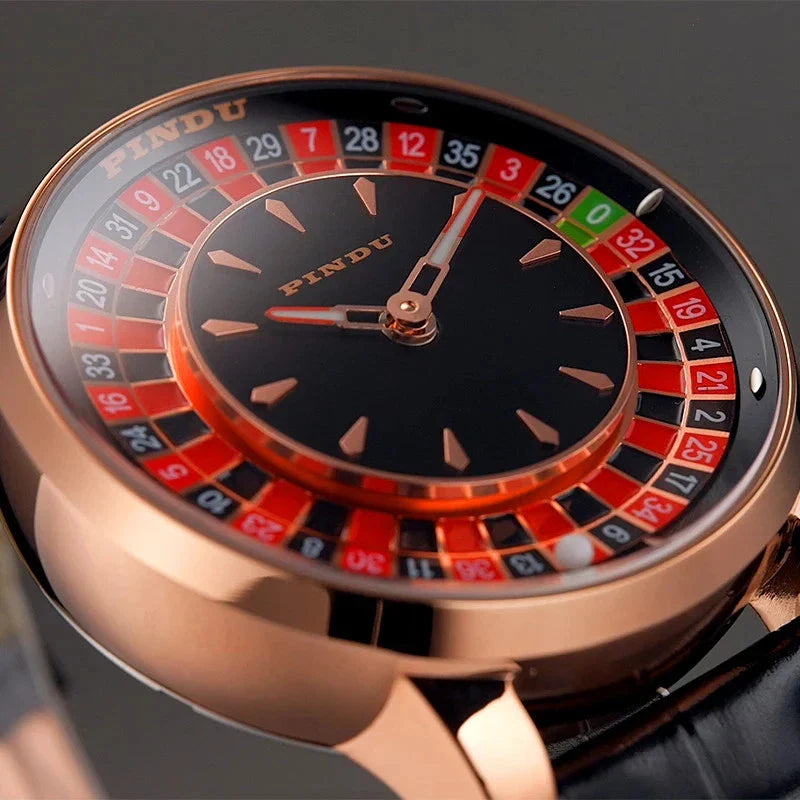PINDU P6629 roulette automatic watch overhead close-up rose gold case black leather strap roulette wheel numbered 1-36 red black green segments complication design detail