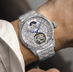PINDU P6637 automatic tourbillon skeleton watch silver case open heart movement moon phase steel bracelet wrist shot