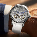 PINDU P6656 double tourbillon diamond watch with white leather strap worn on a man's wrist
