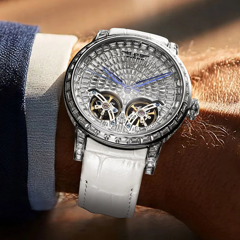 PINDU P6656 double tourbillon diamond watch with white leather strap worn on a man's wrist
